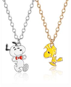 two necklaces that have cartoon characters on them, one in gold and the other in silver