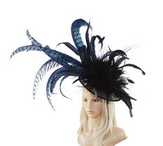 Spring Summer Collection Cinna Fascinator Base measures 12 inches Beautiful Lady Amhurst Natural Pheasant Tail Feathers hand curled with a mass of coque and hackle. We can do this in other colours. please email us for colour requests. With black headband Due to the size this must be sent UPS Please be aware that all fascinators & hats are made to order and during busier times during April May & June dispatch can take up to 7 days. If your event is urgent please contact us for colour availability Adjustable Blue Costume Hats And Headpieces, Blue Headband Party Costume Hat, Blue Feathered Costume Hat, Fitted Blue Headpieces With Feathers, Blue Adjustable Costume Hats For Carnival, Adjustable Blue Costume Hats For Carnival, Blue Feathered Fascinator For Races, Blue Feather Fascinator For Races, Blue Feathered Headpiece For Party