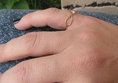 Infinity ring. 14k solid Yellow gold infinity ring. infinity gold ring. infinity ring. dainty gold ring. gold ring. gift for her. infinity jewelry ▶▶This is a great ring to wear by itself, it sure stands out by it's own.. or it can be combined with your every day or festive jewelry for a smart individualist style. It fits both styles, casual and fancy for any occasion◀◀ ♥ About The Ring: The ring's width is 2 mm. ♥ Shipping Info: All rings are packaged and shipped in a beautiful ring box. It tak Gold Stackable Rings With Modern Twist In Infinity Shape, Gold Stackable Infinity Rings With A Modern Twist, Gold Infinity Stackable Rings With A Modern Twist, Modern Twist Gold Infinity Stackable Rings, Elegant Gold Midi Rings With Infinity Shape, Elegant Gold Infinity Midi Rings, Dainty Infinity Stackable Rings For Wedding, Dainty Infinity Stackable Wedding Rings, Gold Minimalist Infinity Midi Rings