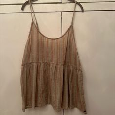 O’neill Adjustable Spaghetti Strap Top. Brown, Tan, White, And Blue Colored In Stripe Pattern. Pull-On. Ruffle Bottom. Tie On Back. O’neill Emblem To Bottom Of Front Of Left Top. 100% Cotton. Size Xl. Never Worn. New With Tags. Beige Spaghetti Strap Tank Top For Beach, Casual Striped Camisole With Spaghetti Straps, Casual Vacation Tops With Adjustable Straps, Casual Camisole For Day Out, Summer Beach Camisole With Adjustable Straps, Summer Beach Tops With Adjustable Straps, Casual Tops With Adjustable Straps, Beige Camisole For Beach, Casual Camisole Beach Tops