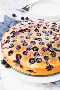 a blueberry cake on a white plate