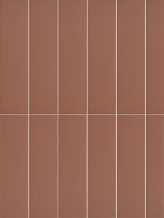 a brown tiled wall with white lines on it