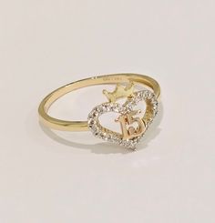 14k Real Solid 2 Tone Gold 15 Anos Quinceanera Heart Corazon Anillo Ring White CZ Stone RG3403 Material Type:  14k Gold Average Weight:    1.5 g Gold Heart-shaped Ring For Birthday, Gold Heart Ring For Valentine's Day Birthday, Yellow Gold Rings For Birthday Or Valentine's Day, Personalized Yellow Gold Jewelry For Sweet 16, Personalized Heart-shaped Jewelry For Sweet 16, Elegant Gold Jewelry For Sweet 16, Average Weight, White Ring, Cz Stone