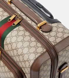 Find GUCCI Savoy Small Carry-on Suitcase on Editorialist. This Gucci Savoy suitcase is crafted from fabric and leather. It features a Gucci logo and a web stripe. This suitcase is designed to be carried on and has wheels for easy travel. It is made in Italy. Gucci Luggage Set, Gucci Luggage, Gucci Logo, Inspiration Kitchen, Carry On Suitcase, Easy Travel, Luggage Sets, Beige Brown, Set Vintage