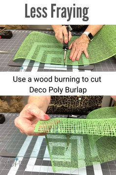 a woman cutting fabric on top of a piece of green material with scissors and tape