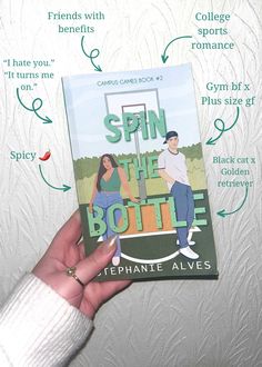 a person holding up a book about spin the bottle