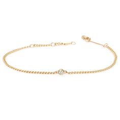 14k extra small hollow curb chain bracelet with a single bezel set diamond set in the chain SPECIFICS• 14k extra small hollow curb chain is 6-6.5-7" adjustable, chain is approx. 2mm wide• 3mm white diamond .10 ctw• available in yellow gold only• Lobster clasp closure***Please note curb chain bracelets can not be resized. Please make sure to order the correct size. Please view our bracelet size guide here. 14k Gold Bracelet With Single Diamond, Diamond Chain Bracelet With Adjustable Chain, Yellow Gold Bracelets With Cable Chain, Diamond Cable Chain Bracelet In Yellow Gold, Elegant 14k Gold Diamond Bracelet With Curb Chain, Classic 14k Gold Diamond Bracelet With Chain, 14k White Gold Chain Bracelet With Diamond, Classic Diamond Bracelet With Chain, White Gold Bracelet With Single Diamond