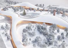 an aerial view of a snowy landscape with trees and buildings in the foreground, surrounded by snow - covered ground