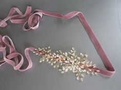 This delicate romantic belt is beautifully hand made with fancy Swarovski crystals twisted into this intricate design. The crystal design measures about 10 long and 3 wide. It is attached to a 5/8 wide double face velvet ribbon measuring 150 long. This belt is available in gold, silver Elegant Pink Bridal Belt With Sashes, Adjustable Bridal Belt With Sashes For Party, Adjustable Sashes Bridal Belt For Party, Mauve Velvet, Bridal Sash Belt, Crystal Belt, Wedding Sash Belt, Crystal Hair Pins, Belt Gold