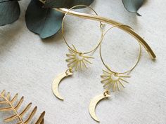 big brass hoop earrings with sun and moon Those stunning hoop earrings were made with love and are designed to stand out. One earring measures approx. 7 x 3 cm. The brass hoop has a diameter of 3 cm and the wire itself has a diameter of 0,8 mm. ~❋ Good to know ❋~   ▸ it's designed and handcrafted with love  ▸ high quality indian brass beads, nickel free, no allergies --✦--✦--✦--✦--✦--✦--✦--✦--✦--✦--✦-- ~❋ maraba design ❋~ I believe in magic, in love, in beauty and in the good within every single Bohemian Crescent Hoop Earrings With Ear Wire, Brass Earrings With Sun And Moon Design For Festival, Brass Sun And Moon Design Earrings For Festival, Brass Sun And Moon Festival Earrings, Bohemian Dangle Hoop Earrings With Moon Charm, Bohemian Hoop Earrings With Moon Charm Dangle, Bohemian Hoop Earrings With Moon Charm, Bohemian Crescent Hoop Earrings With Moon Charm, Bohemian Brass Earrings With Sun And Moon Design