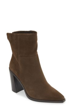 Elevate your cool-season looks with this sleek side-zip bootie framed with a snipped pointy toe and angular stacked heel. 3 1/2" heel 7 1/2" shaft; 12" calf circumference Leather upper/textile and synthetic lining/synthetic sole Imported Fall Boots With Zipper Closure And Pointed Toe, Modern Fall Boots With Stacked Heel, Fall Mid-calf Boots With Sculpted Heel, Fall Ankle Booties With Sculpted Heel, Trendy Fall Boots With Side Zipper, Chic Boots With Side Zipper For Fall, Trendy Fall Mid-calf Boots With Sculpted Heel, Trendy Mid-calf Boots With Sculpted Heel For Fall, Trendy Side Zipper Boots For Fall