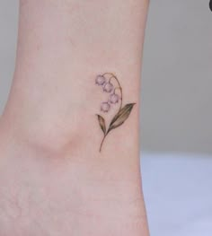 a small flower tattoo on the ankle is very feminine and delicate, it's easy to draw