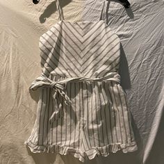 Cute And Comfy Stripped Romper. Smocked Back. Comes With A Tie/Belt. Size L Black Romper Shorts, Yellow Jumpsuit, Jumpsuit Navy Blue, Girls Joggers, Jumpsuit Dressy, Blue Jumpsuits, Ruffle Romper, Striped Rompers, Floral Jumpsuit