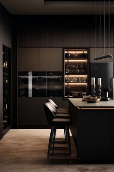 a modern kitchen with black cabinets and stools in front of an island countertop