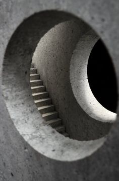 there is a concrete structure with stairs in it