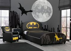 a batman themed bedroom with the moon in the background