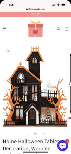 a black and white house with halloween decorations on it