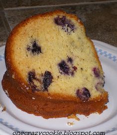 a slice of blueberry pound cake on a plate