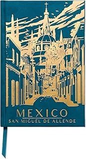 a blue and gold colored book with the words mexico written in spanish, on it