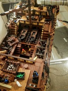 a model of a pirate ship made out of legos and other items on display