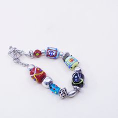 "7\", vintage Silpada Sterling Silver Lampwork Art Glass Bead Toggle Bracelet B0871, stamped 925" Vintage Silver Beads For Gifts, Vintage Silver Beads, Vintage Multicolor Metal Beaded Bracelets, Vintage Handmade Silver Beaded Bracelets, Vintage Adjustable Multicolor Charm Bracelet, Adjustable Vintage Multicolor Charm Bracelet, Vintage Adjustable Beaded Bracelets With Silver Beads, Vintage Spacer Beads Bracelets Gift, Vintage Multicolor Adjustable Charm Bracelet