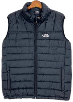 Black Sleeveless Vest For Outdoor Activities, Black Vest For Outdoor Activities, Black Sleeveless Vest For Outdoors, Sleeveless Puffer Vest For Cold Weather, Functional Sleeveless Vest For Cold Weather, Sleeveless Nylon Vest For Cold Weather, The North Face Vest, Puffy Vest North Face, Black North Face Gilet