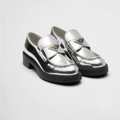 Metallic Leather Loafers Pointed Toe Patent Leather Loafers With Rubber Sole, Modern Flat Platform Loafers For Formal Occasions, Modern Patent Leather Pointed Toe Loafers, Silver Leather Loafers For Work, Modern Flat Heel Loafers For Galas, Modern Silver Loafers With Round Toe, Pointed Toe Patent Leather Loafers With Leather Sole, Patent Leather Pointed Toe Loafers With Leather Sole, Luxury Wingtip Patent Leather Loafers