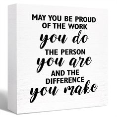 a white canvas with black lettering that says, may you be proud of the work you do