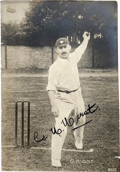 an old black and white photo of a baseball player with his hand in the air