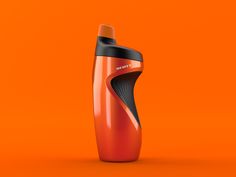 an orange and black plastic bottle on an orange background