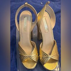 Leather Like Gold Platform Size 9 Worn Once Trendy Gold Sandals For Formal Occasions, Trendy Gold Formal Sandals, Trendy Gold Sandals With Wrapped Heel, Gold Open Heel Vacation Heels, Gold Ankle Strap Heels For Vacation, Gold Synthetic Sandals For Night Out, Chic Gold Synthetic Sandals, Gold Heels For Spring Vacation, Gold High Heel Sandals For Vacation