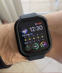 a close up of a person wearing a smart watch