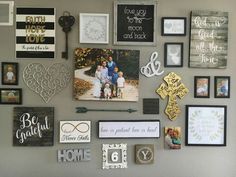 a wall covered in pictures and magnets on it's side, with the word love written across them