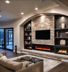 modern living room with fireplace and built - in entertainment center