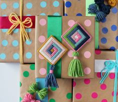 presents wrapped in brown paper and decorated with colorful beads, tassels and bows