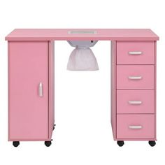 a pink desk with drawers and a sink