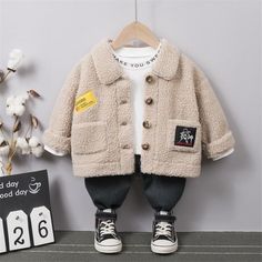 Fleece-lined Buttom Design Jacket for Children Boy - PrettyKid Long Sleeve Beige Fleece Jacket For Winter, Beige Long-sleeve Fleece Jacket For Winter, Beige Long Sleeve Fleece Jacket For Winter, Long Sleeve Fleece Jacket With Buttons For Winter, Warm Long Sleeve Cotton Outerwear, Warm Cream Long Sleeve Outerwear, Winter Fleece Outerwear With Button Closure, Long Sleeve Fleece Outerwear With Buttons, Cream Long Sleeve Fleece Jacket For Winter