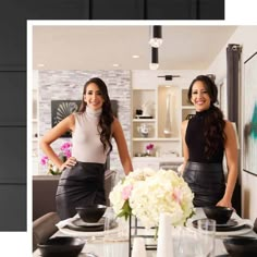 two women standing next to each other in front of a table with plates and bowls on it