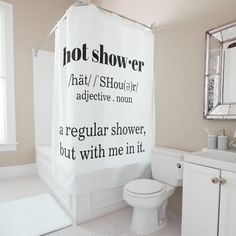 a bathroom with a shower curtain that says, hot shower hat / shower / adjective noon a regular shower, but with me in it