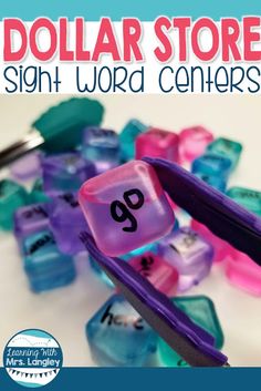 the dollar store sign word centers are made out of plastic dices with numbers on them