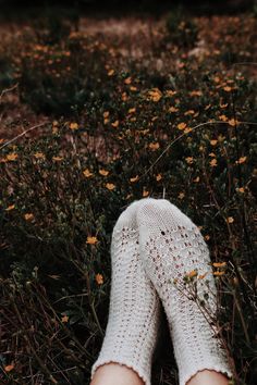 "Lace Socks Knitting Pattern, Socks Knit Pattern | ROSEHIP SOCKS \"Gorgeously textured lacework inspired by Colorado rosehips that speckle the mountainous fields in autumn make The Rosehip Socks a delightful project.\" ☑ Instant download PDF file for The Rosehip Socks knitting pattern ☑ Skill level: Advanced-beginners (simple lace stitches + techniques; links to helpful video tutorials provided). All Darling Jadore patterns come with a Stitch Glossary containing written instructions and links to Comfortable Knitted White Socks, Comfortable White Knitted Socks, Knit Socks Pattern, Triangle Scarf Crochet Pattern, Chunky Knit Sweater Pattern, Knitting Pattern Easy, Socks Knitting Pattern, Double Pointed Knitting Needles, Knit Boot Socks