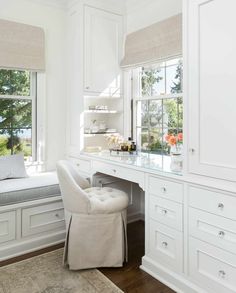 a white desk and chair in a room