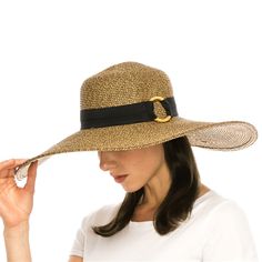 A fabulous straw beach hat. Grosgrain band with large bamboo ring detail. Slightly floppy brim, 6" wide. Ribbon inner band with drawstring to reduce size. UPF 50+ rated sun protection hat. The extra wide brim provides excellent sun coverage. One size, 57 cm. 100% paper braid. Adjustable Chic Straw Hat For Vacation, Chic Straw Sun Hat For Vacation, Chic Braided Straw Hat For Beach, Chic Adjustable Straw Hat For Vacation, Chic Braided Straw Sun Hat, Elegant Sun Hat For Beach Travel, Elegant Braided Straw Hat For Summer, Chic Braided Beach Hats, Elegant Brimmed Sun Hat In Paper Straw