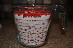 a blender filled with red and white liquid