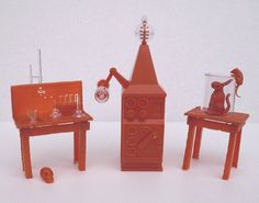 there are three miniature pieces of furniture that look like they have been made out of clay