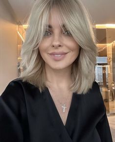 Haircut 2023 Medium Length, French Bangs With Face Framing Layers, Curtain Bangs Feathered Hair, Mid Length Hair With Curtain Bangs Round Face, Mid Length Haircut 2023, Medium Length Haircut For Heavy Women, Blending Roots With Blonde Hair, Mid Length Blonde Hairstyles, Celebrity Hair 2023