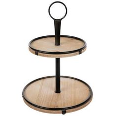 two tiered wooden tray with black metal handles on each side and round wood bottom