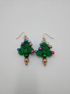 A fun set of Christmas shaped earrings perfect as a stocking stuffer! ⚬ Free shipping on all orders $35 or above ⚬ Each piece is handmade ⚬ Made in the USA. ⚬ More in our shop: https://www.etsy.com/shop/BellaLilahJewelry QUESTIONS? Please feel free to message me anytime! I'd love to hear it and I'm ready to answer all of your questions! Thank you for visiting Bella Lilah. Handmade Christmas Earrings For Celebration, Novelty Christmas Jewelry For The Holidays, Handmade Christmas Celebration Earrings, Novelty Christmas Holiday Jewelry, Christmas Holiday Novelty Jewelry, Handmade Festive Earrings For Christmas, Green Holiday Earrings For Festive Occasions, Green Earrings For Festive Holiday Occasions, Novelty Green Earrings For Party