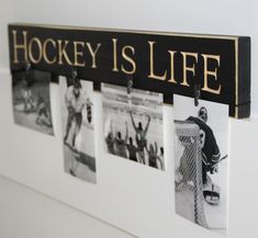 a hockey is life sign hanging on the wall next to some pictures and magnets