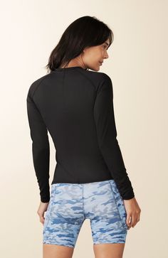 Streamlined Long Sleeve Top, a lightweight workout layer that's as versatile as it is stylish. Whether you're practicing yoga or embracing an active lifestyle beyond the studio, this top is a forward stunner that effortlessly elevates your look.  At LOSANO we help elevate every moment with clothing that is better for you! Crew neck Curved contrast panels Body skimming Split hem PFA Free BPA Free Moisture wicking Breathable UV Protective Made from sustainable materials 79% Recycled Polyester 21% Versatile Moisture-wicking Stretch Activewear, Versatile Moisture-wicking Activewear, Breathable Fitted Activewear, Fitted Breathable Versatile Activewear, Versatile Nylon Compression Activewear, Stretch Nylon Activewear, Medium Support Activewear With Thumbholes For Training, Stretch Elastane Activewear With Thumbholes, Elastane Activewear With Thumbholes For Yoga